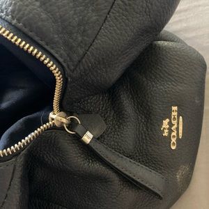 Black and gold coach purse